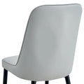 Contemporary Set of 4 Faux Leather Dining Chairs with Cushioned Backrests and Metal Legs – Ideal for Dining Rooms, Living Rooms, and Bedrooms