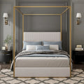 Contemporary Luxe Metal Canopy Bed Featuring a High Upholstered Headboard