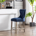 Carter 24-Inch Wingback Tufted Counter Stool with Antique Grey Legs and Nailhead Trim