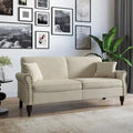 Upholstered Loveseat with Rolled Arms and 73 Nailhead Trim