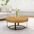 Contemporary Round Wooden Coffee Table with Intricate Carving and Metal Legs